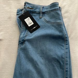 Never worn fashion nova high waist skinny jeans. Light wash. Women’s size 11.